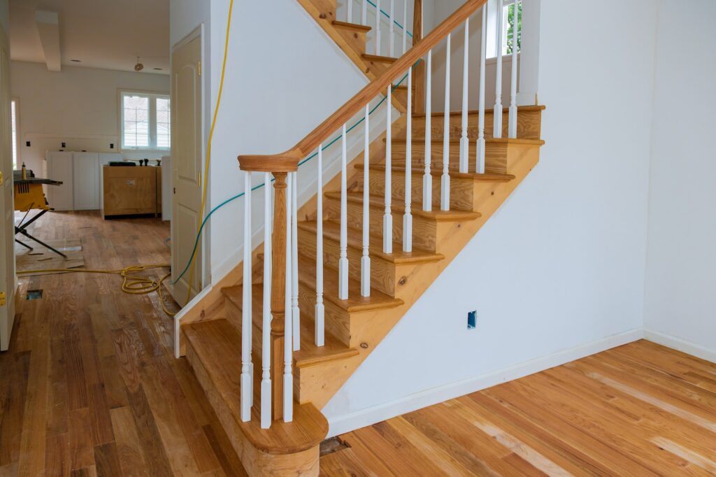 Wooden planks around pole stairs handrails renovation for railing for stairs